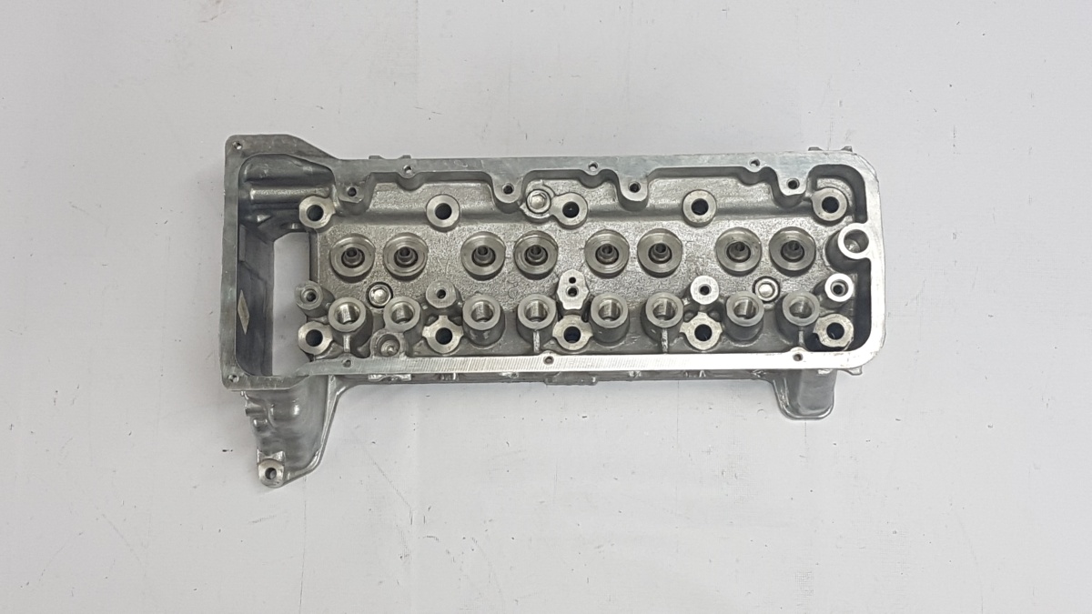 Головка блока цилиндров 21011 голая без шпилек