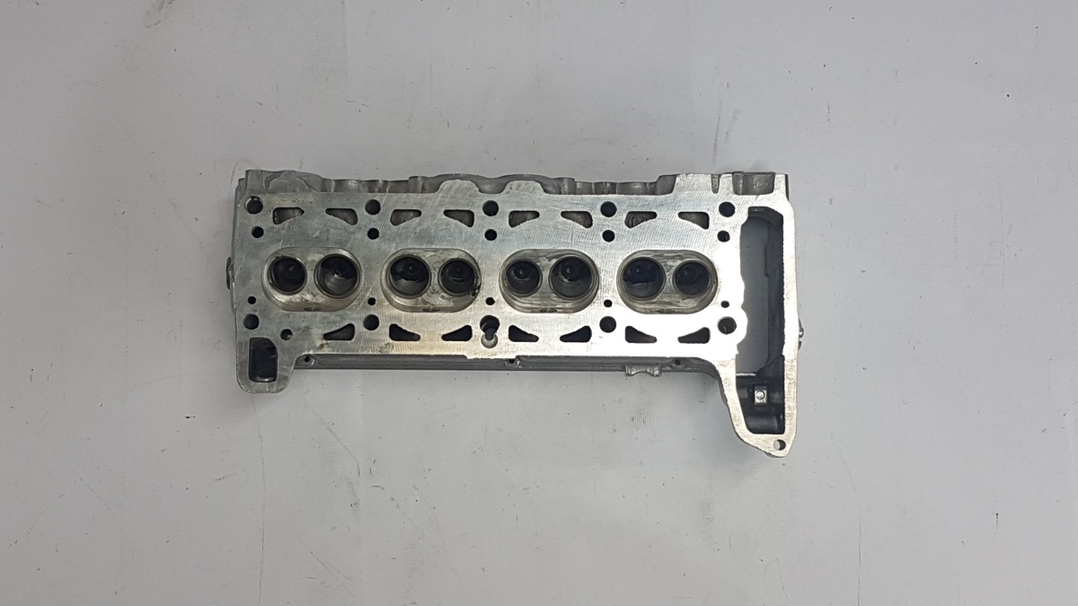 Головка блока цилиндров 21011 голая без шпилек